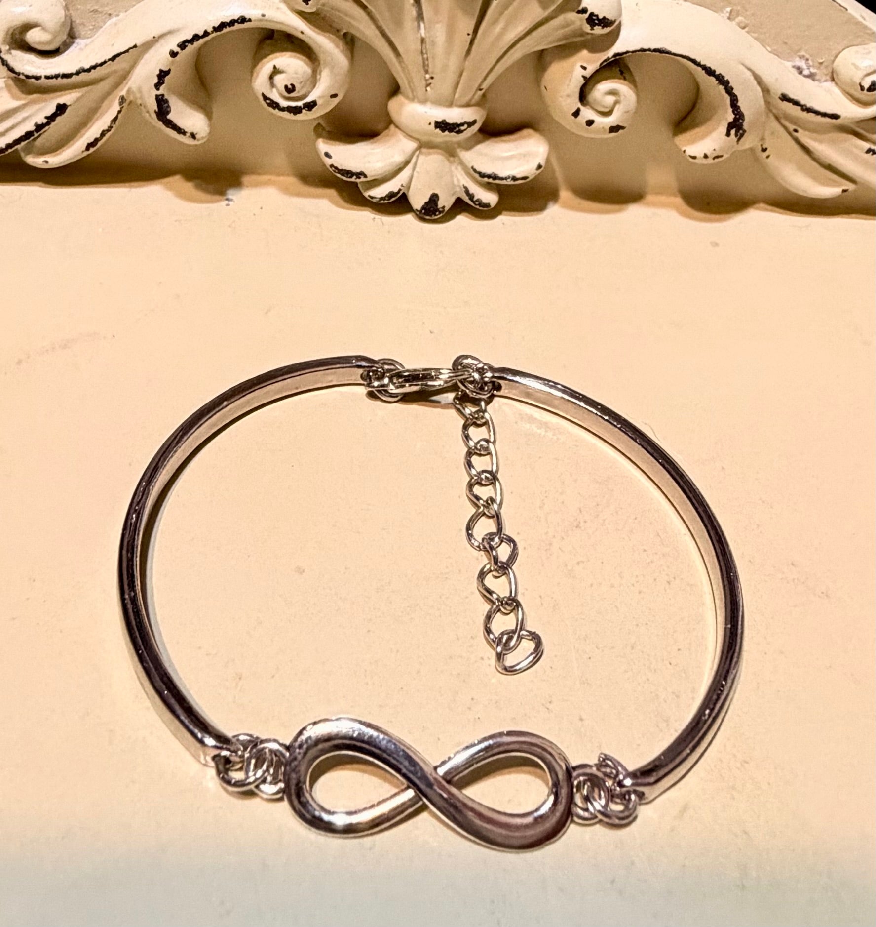 Silver Plated Infinity Adjustable Bracelet by Suzie with Sublime Designs