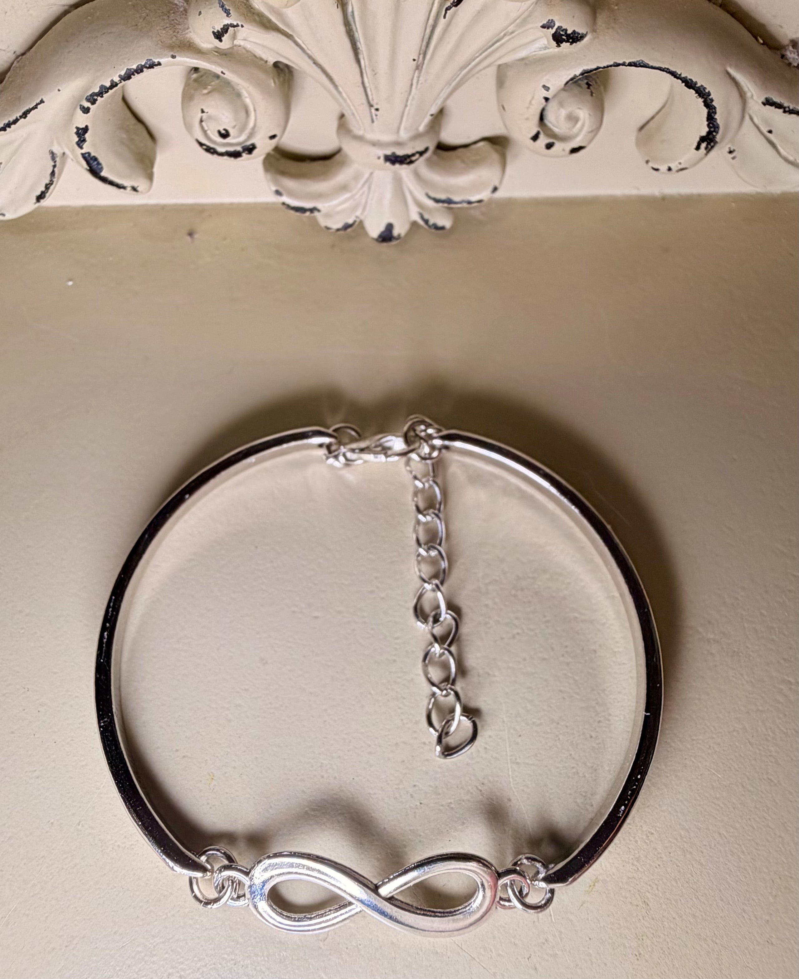 Silver Plated Infinity Adjustable Bracelet by Suzie with Sublime Designs
